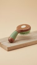 Ergonomic pet grooming brush, Use a 3/4 angle for product shots to showcase the ergonomic design and materials. Products...